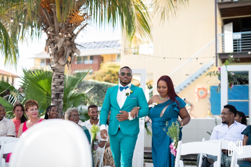 Groom walking down the aisle