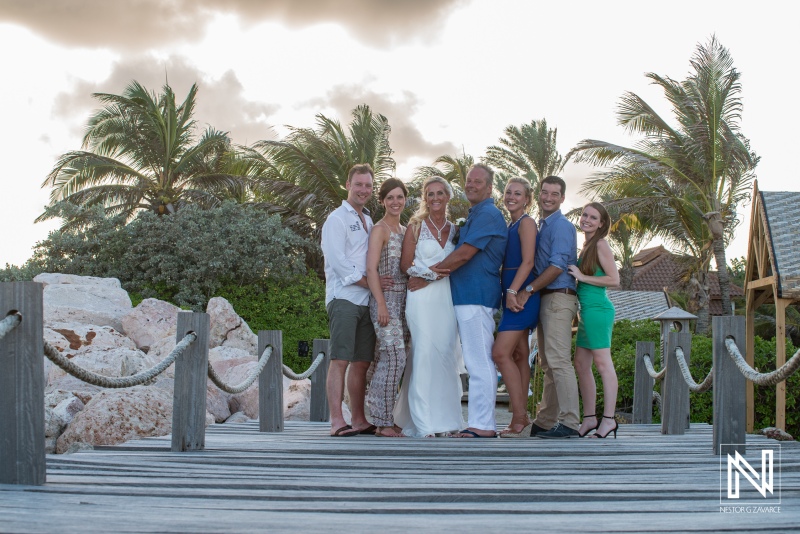 family of the bride and groom photoshoot on the pier