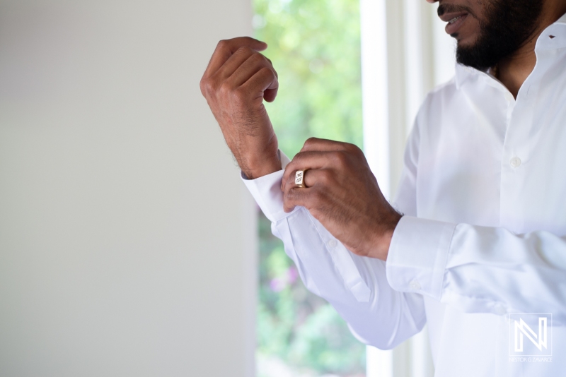 Groom getting dressed