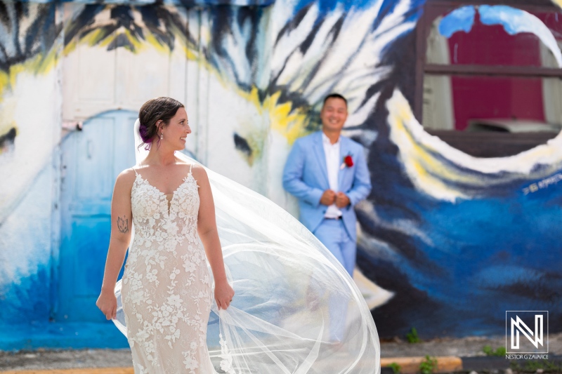 Wedding celebration at Kokomo Beach Curacao with stunning bride and groom in a vibrant setting