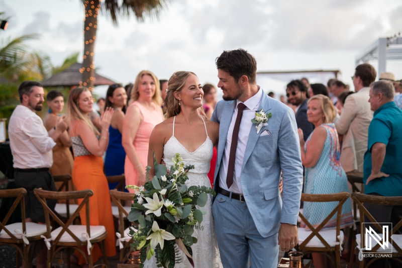 Bride and groom walking out