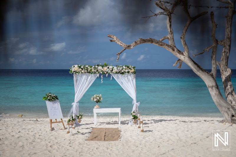 Wedding setup at Cas Abao Beach with flowers and decorations