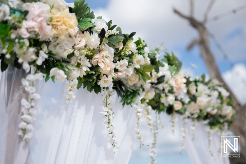 Wedding setup with flowers at Cas Abao Beach in Curacao during a bright day