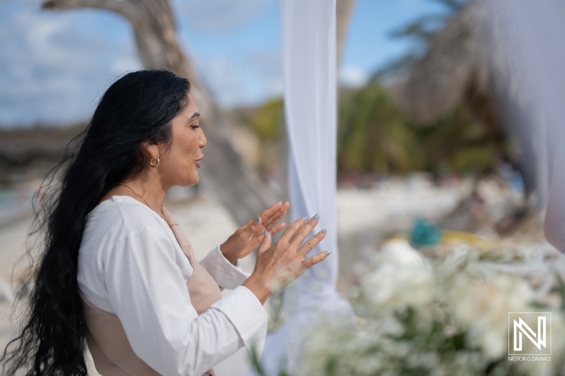 Wedding ceremony at Cas Abao Beach in Curacao takes place on a sunny day