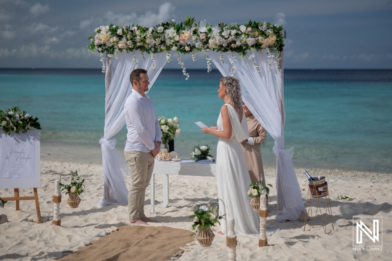 Wedding ceremony at Cas Abao Beach in Curacao with beautiful ocean backdrop