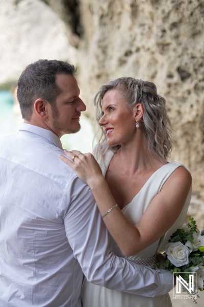 Wedding ceremony at Cas Abao Beach in Curacao with a couple sharing a moment together