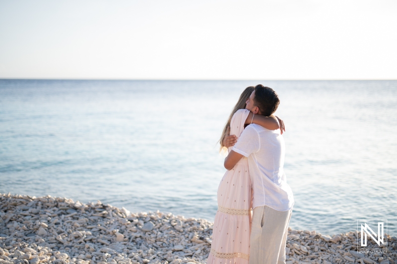 couple hug at the beach