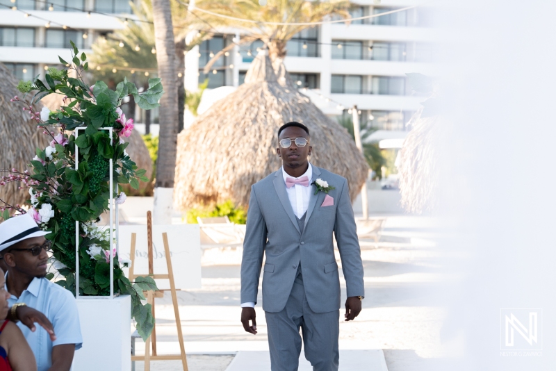 Groom walking down the aisle