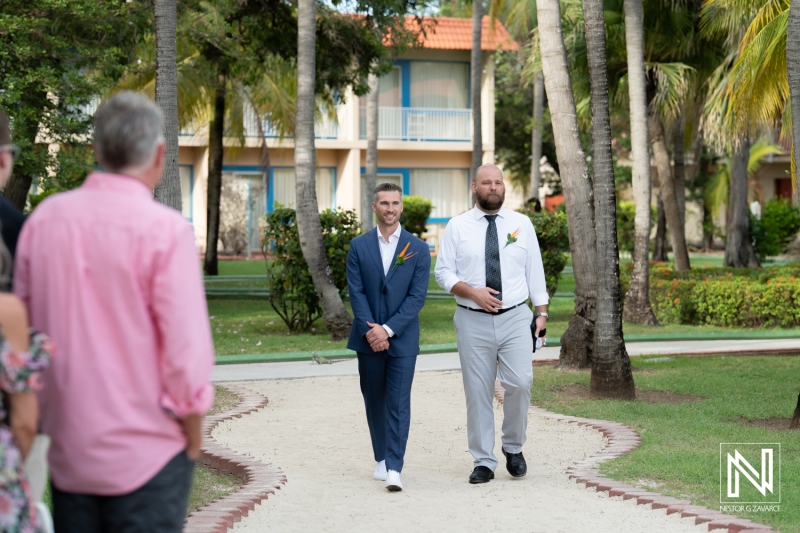 Groom walking down the aisle