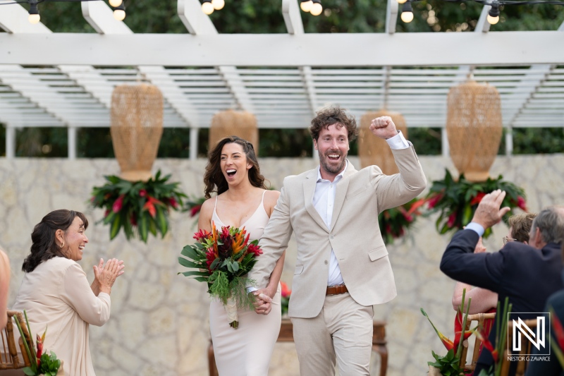 Bride and groom exit