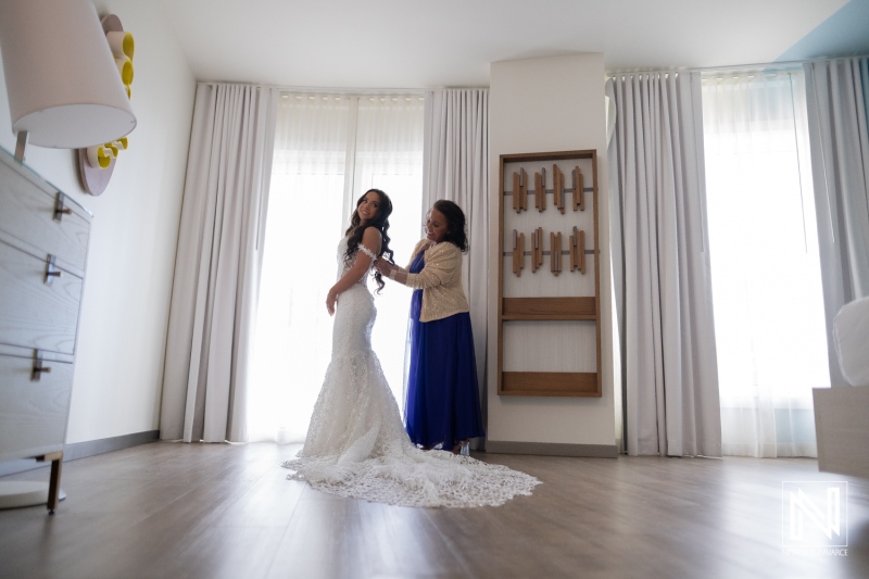 Wedding preparation at Renaissance Wind Creek Curacao Resort with bride getting ready in a hotel room