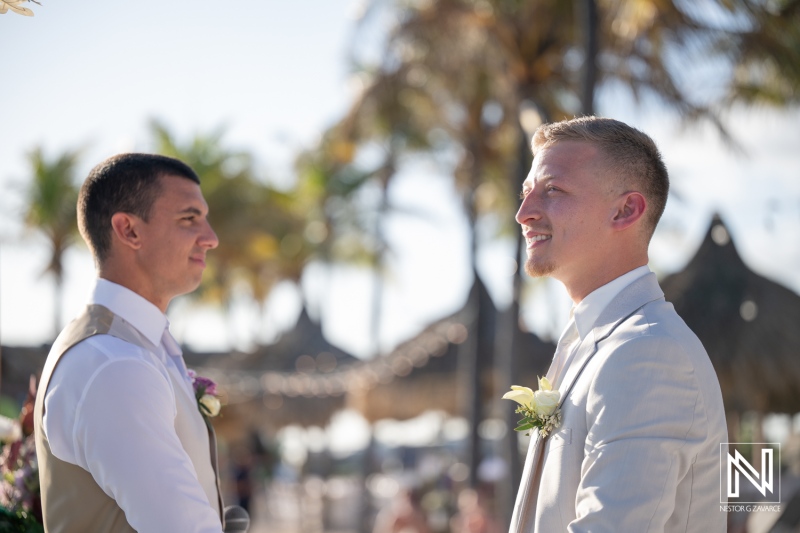 Couple exchanges vows during a wedding ceremony at Renaissance Wind Creek Curacao Resort in Curacao
