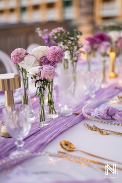 Couple celebrates wedding with floral decorations at Renaissance Wind Creek Curacao Resort in beautiful Caribbean setting