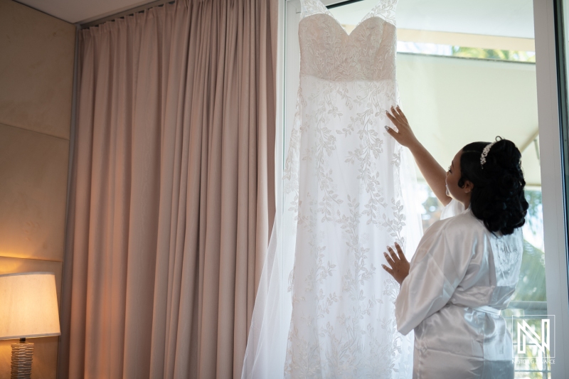 Bride looking at the dress