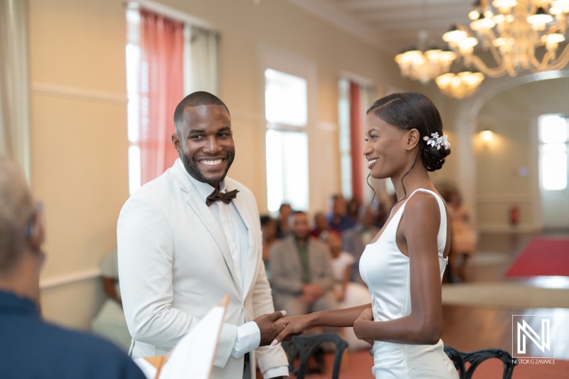 A joyful wedding ceremony in an elegant venue with a smiling couple exchanging vows during a beautiful afternoon gathering