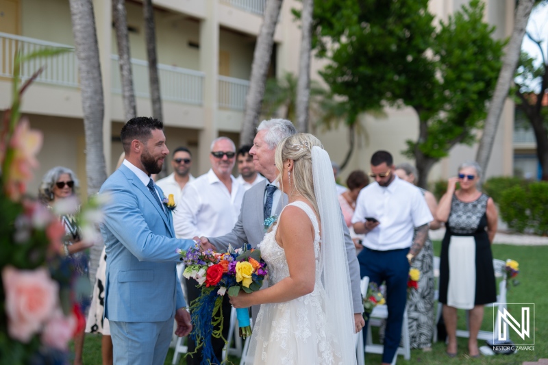 Wedding ceremony held at Sunscape Curacao Resort with a beautiful tropical backdrop on a sunny day