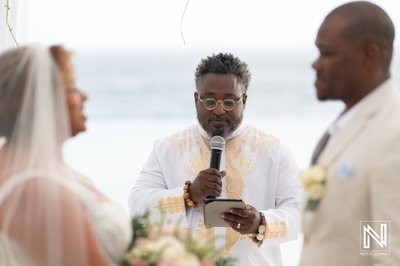 Beautiful wedding ceremony at Renaissance Wind Creek Curacao Resort during sunset with heartfelt vows exchanged