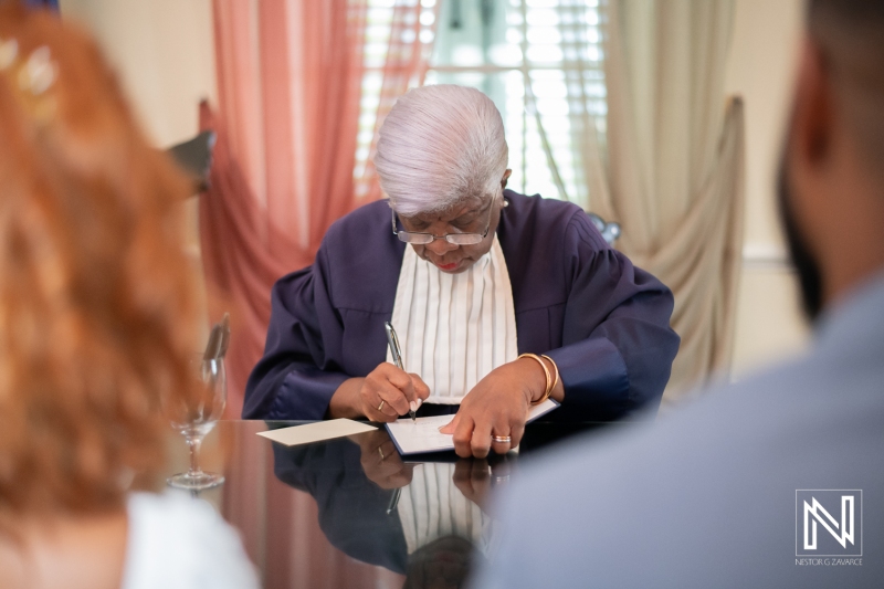 Signing the papers