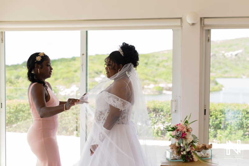 Bride getting into attire