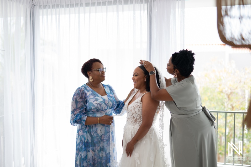 Nuptial preparations with family support at Playa Hunku wedding venue in Curacao