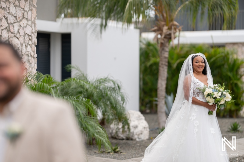 Celebrating love and joy at a beautiful wedding ceremony at Playa Hunku in Curacao during a sunny day