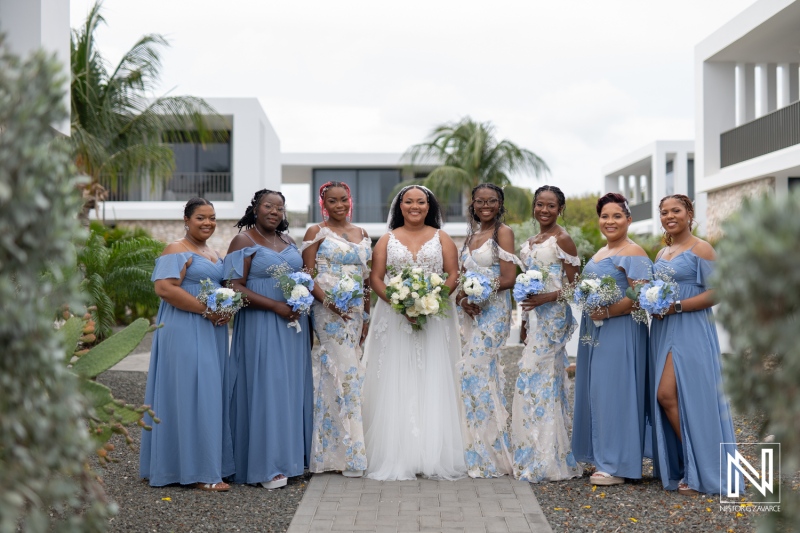 Bridal party celebration at Playa Hunku wedding venue in Curacao with stunning floral arrangements
