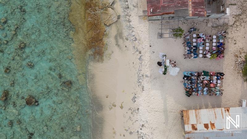 Beautiful wedding ceremony at Playa Hunku in Curacao with breathtaking ocean views and white sandy beach
