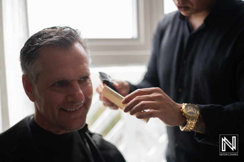 Groom getting hair done