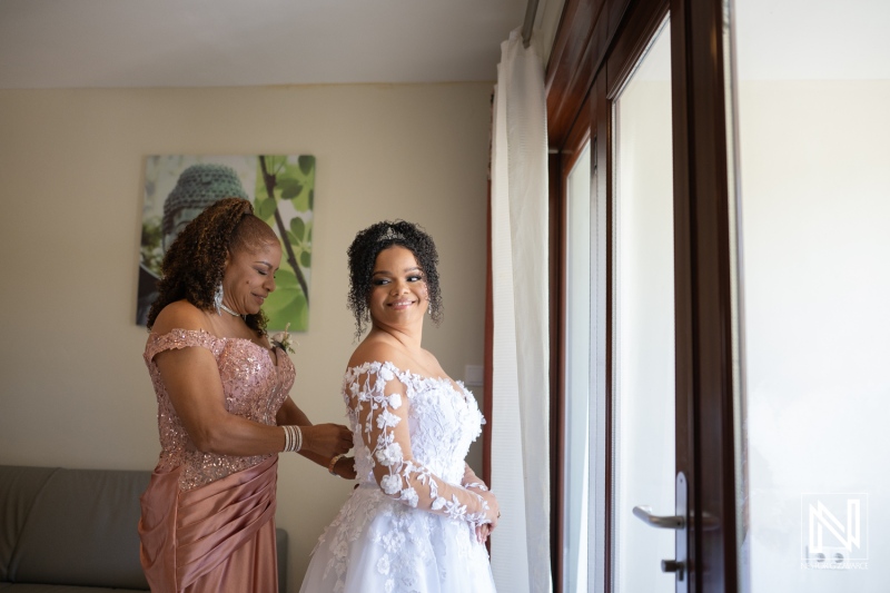 Bride getting ready in a beautiful room at Acoya Curacao Resort for her wedding day celebration