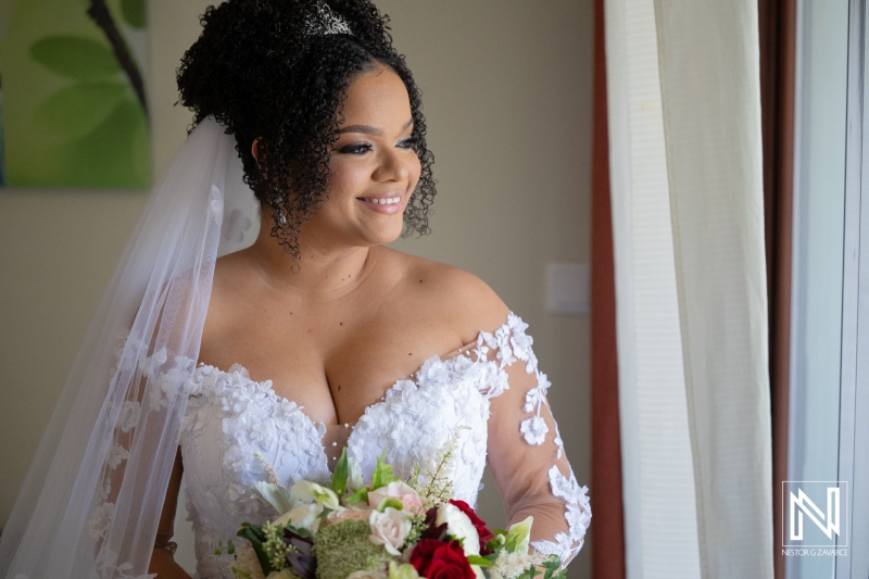 Beautiful bride ready for her wedding at Acoya Curacao Resort with a bouquet, preparing for a special day in paradise