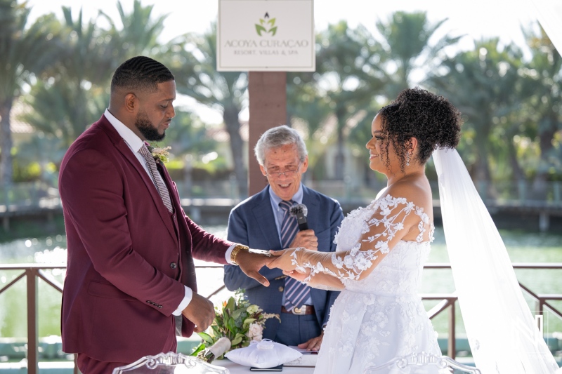 Couple exchanges vows during a beautiful wedding ceremony at Acoya Curacao Resort in sunny Curacao