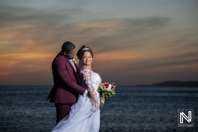 Wedding celebration at Acoya Curacao Resort with sunset backdrop and romantic couple moments by the ocean