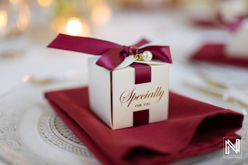 Elegant wedding favor box on a beautifully set table at Marjorie's Party Palace in Curacao