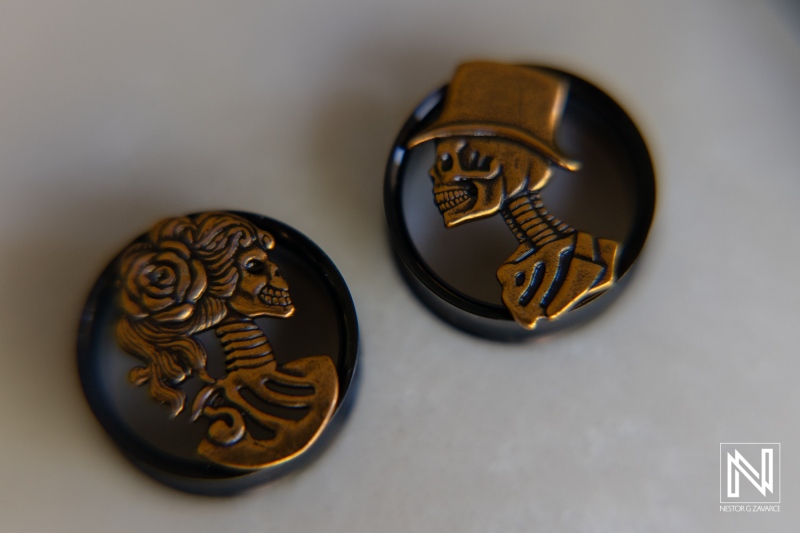 Halloween themed couple buttons featuring skeleton designs, captured at Sunscape Curacao Resort during a wedding