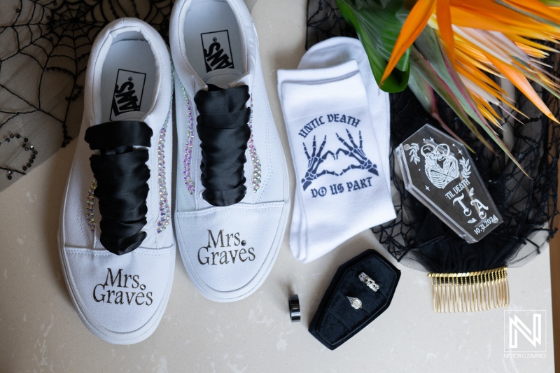 Wedding accessories for a Halloween-themed celebration at Sunscape Curacao Resort in Curacao featuring custom shoes and elegant decorations