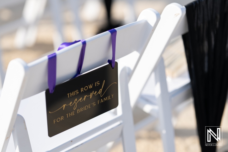 Reserved seating for the bride's family during a Halloween wedding ceremony at Sunscape Curacao Resort in Curacao