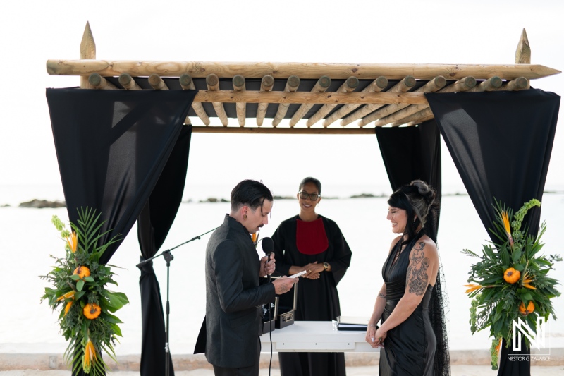 Wedding ceremony at Sunscape Curacao Resort during Halloween celebration with beautiful ocean backdrop