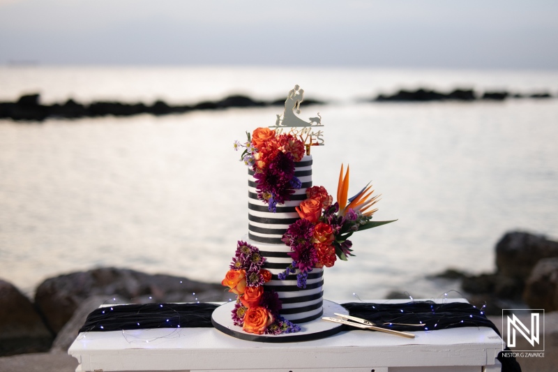 Elegant Halloween wedding cake display at Sunscape Curacao Resort near the tranquil Caribbean Sea