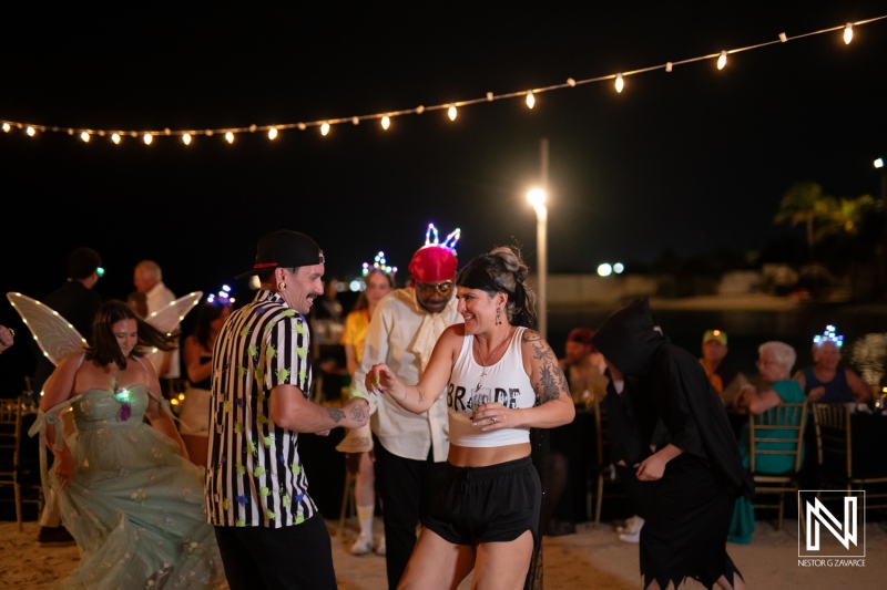 Celebrating Halloween with a vibrant wedding dance party at Sunscape Curacao Resort in Curacao under starry skies