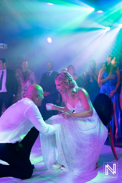 Groom getting the garter