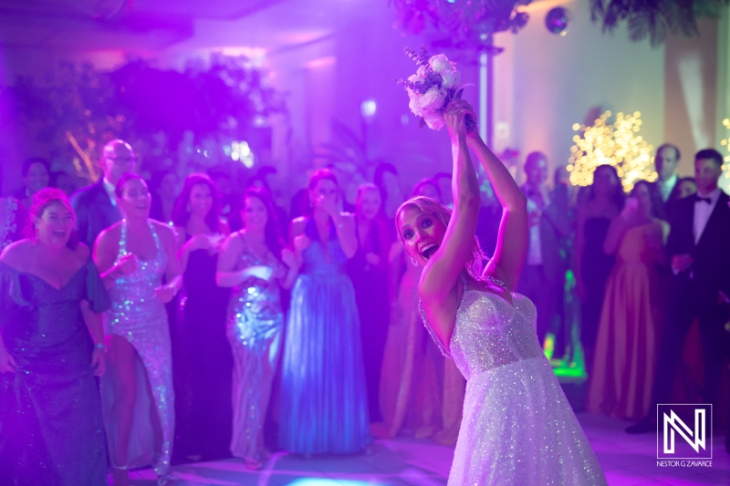 Bride throwing bouquet
