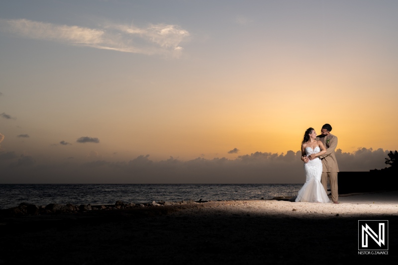 A Romantic Sunset Moment of a Couple on a Beach, Celebrating Their Wedding Together, Surrounded by a Tranquil Ocean Landscape During Twilight