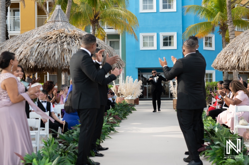 Groom walking down the aisle