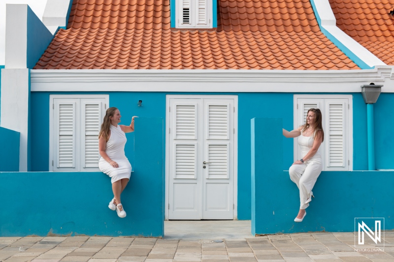 LGBT couple celebrates love during a beautiful wedding photoshoot at sunset in Willemstad, Curacao