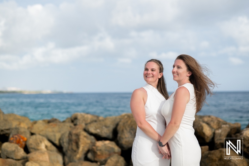 LGBT wedding photoshoot celebrating love during a stunning sunset in Willemstad, Curacao