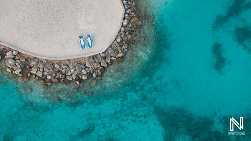 LGBT wedding celebration during sunset at Willemstad, Curacao with breathtaking ocean views