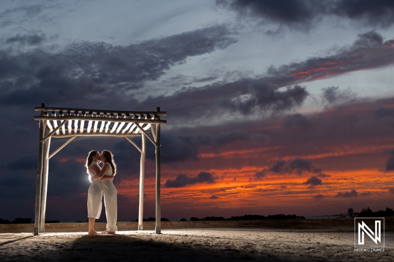 LGBT wedding celebration at sunset in Willemstad, Curacao, showcasing love and beauty in a picturesque coastal location