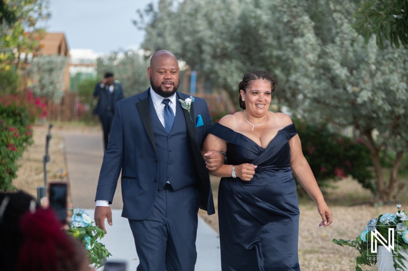 Groom walking down the isle