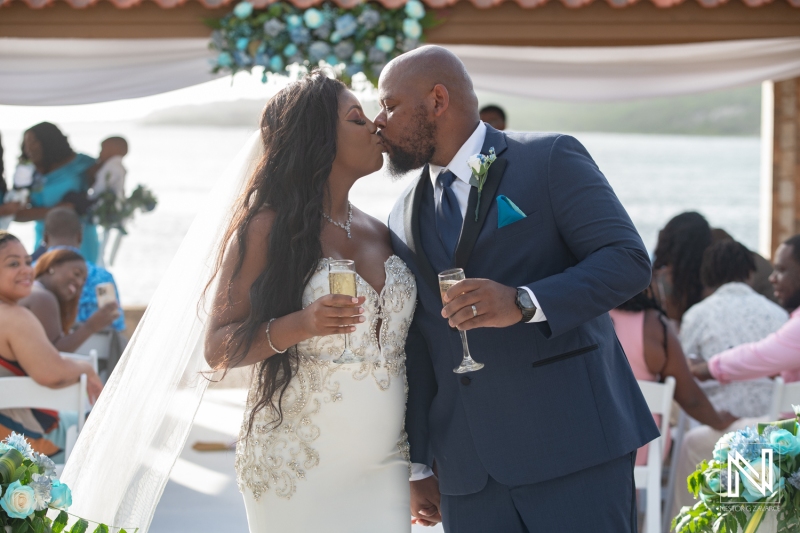 Bride and groom kiss