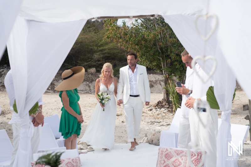 Bride and groom walking down the aisle
